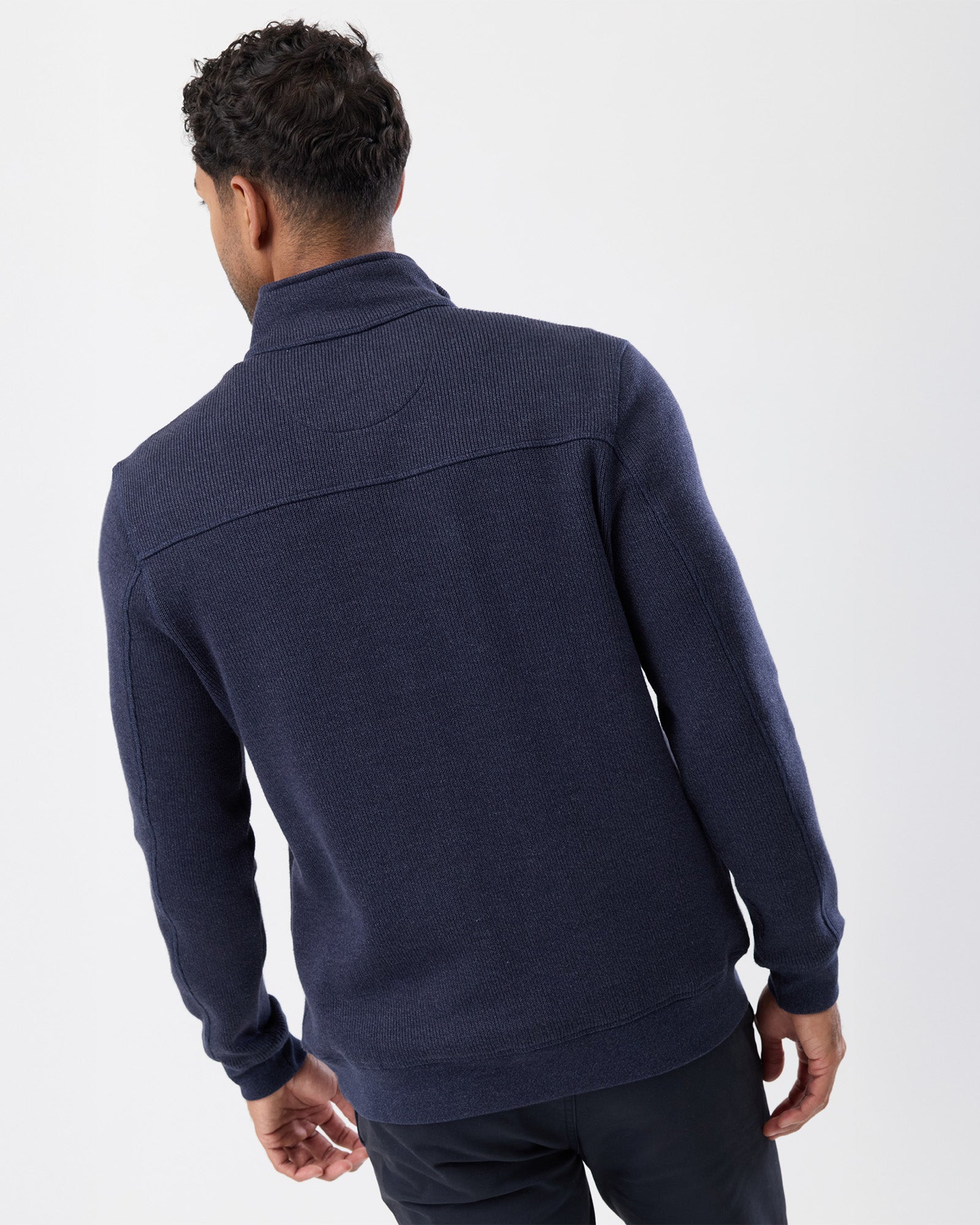 Back view of men’s French rib half zip cotton knit