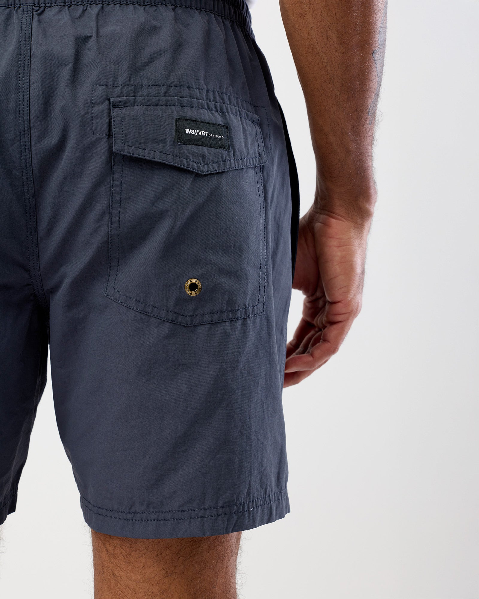 Vintage Blue shorts with Wayver Originals brand logo on a white background, rear pocket view