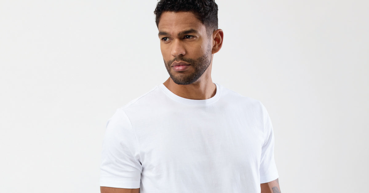Man wearing white t-shirt, close view