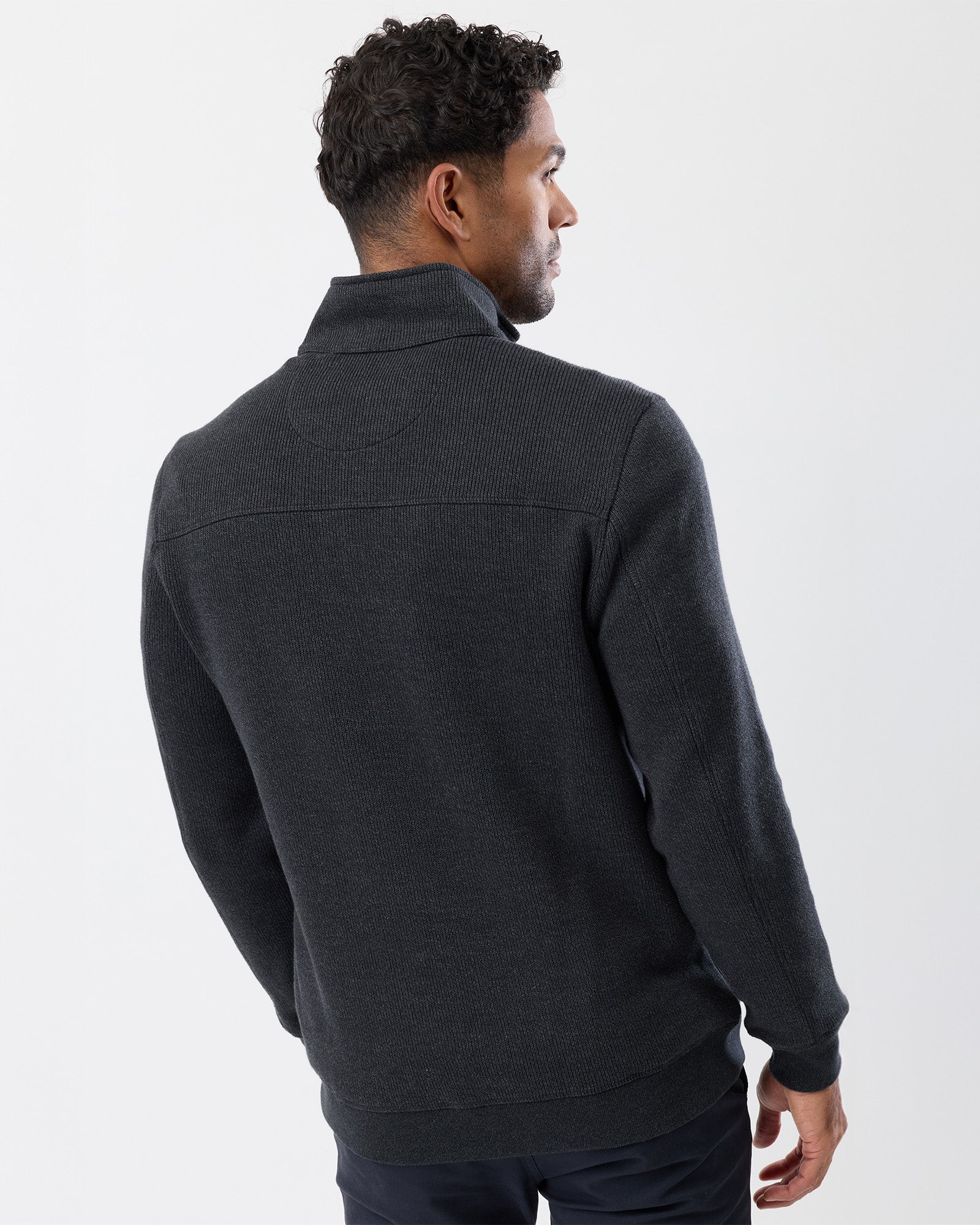 Back view of men’s French rib half zip cotton knit