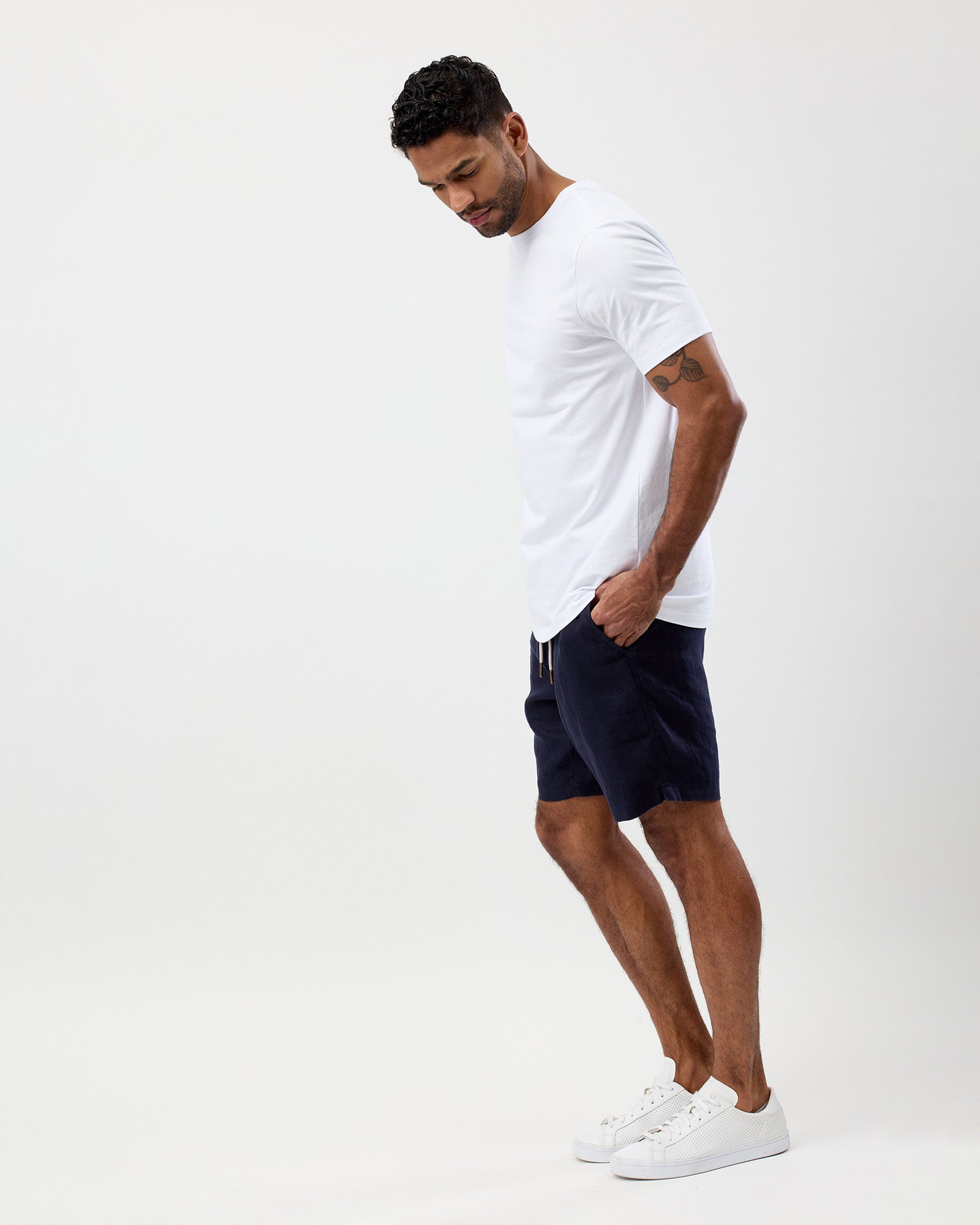 Men's navy 100% linen summer shorts styled with a white T-shirt