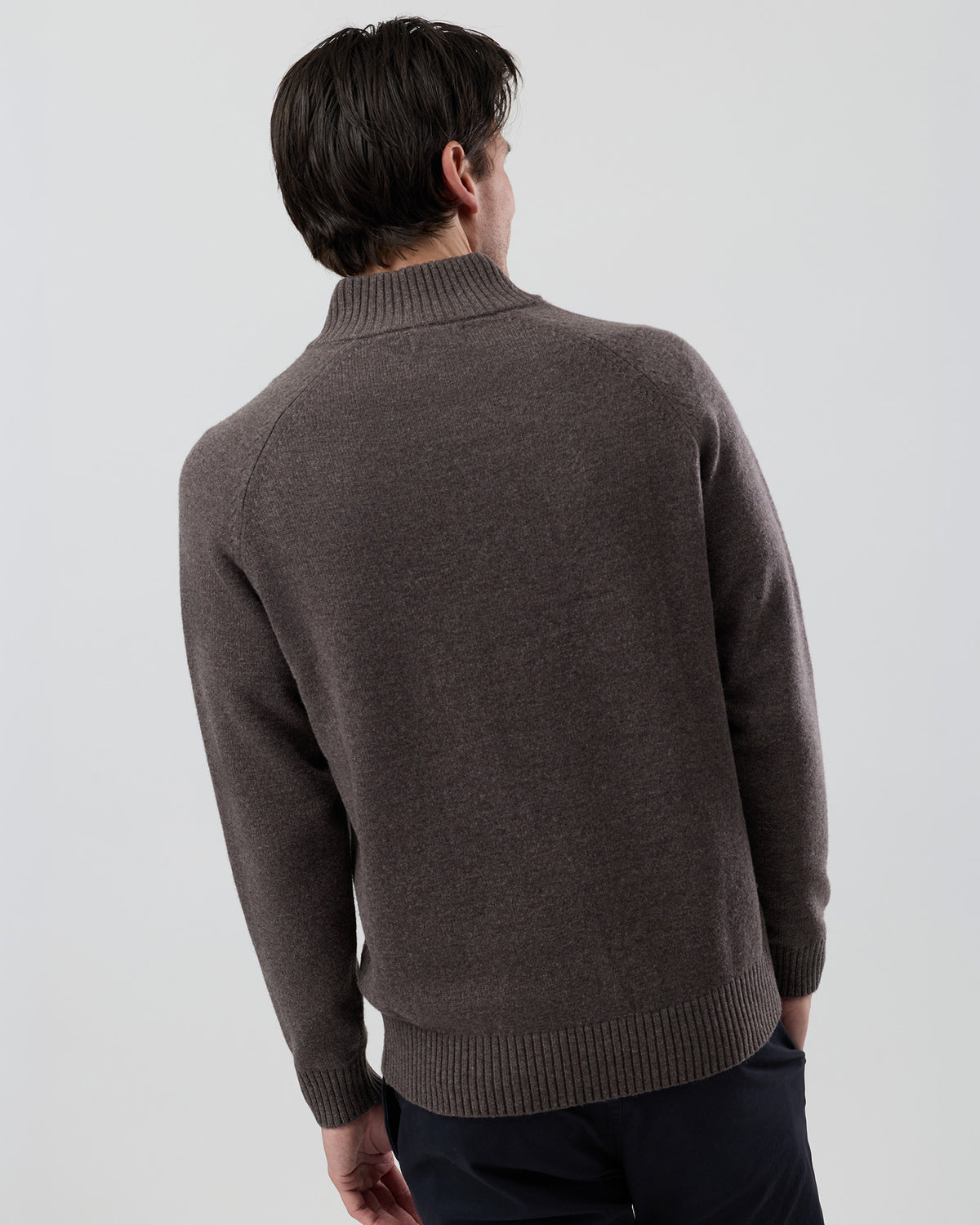 Rear view of the Wayver brown marl wool blend stand collar jumper showing the clean back profile and textured marl finish.
