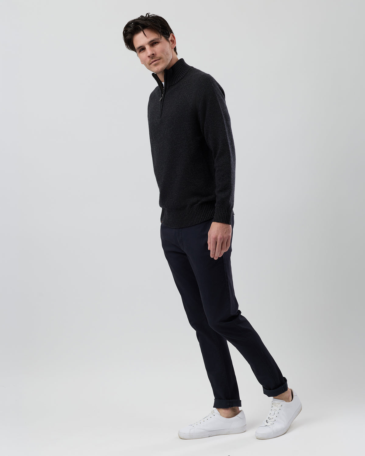 Full-length side profile of a men's charcoal wool blend quarter zip jumper showing the regular fit and slim sleeves.