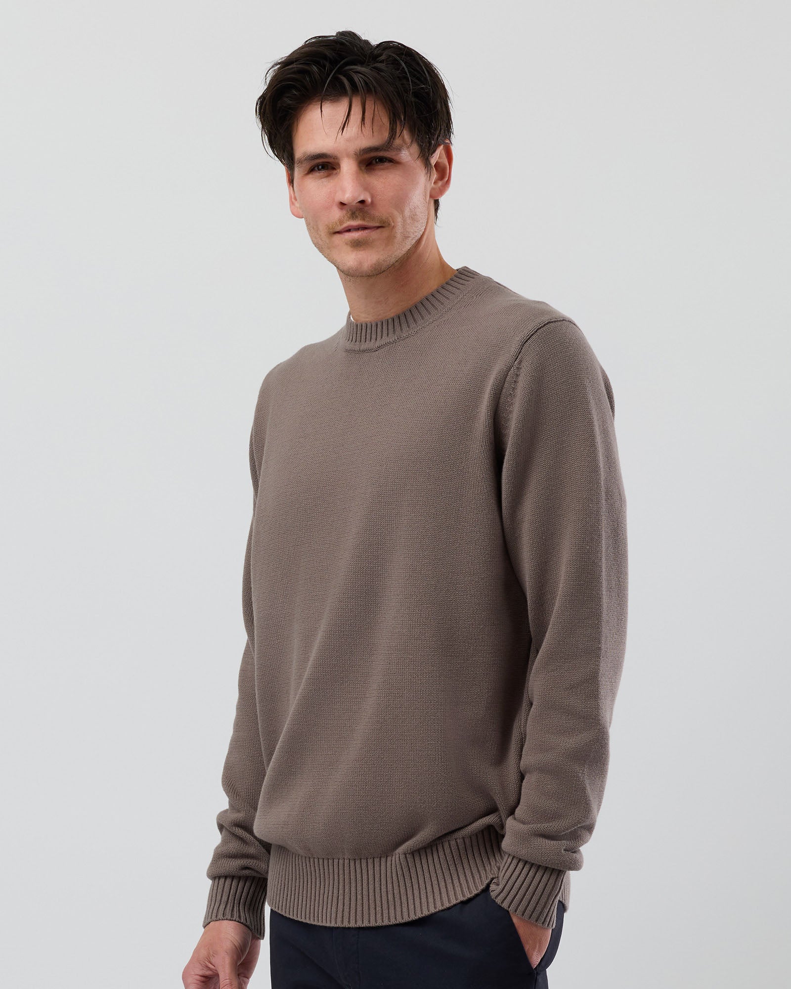 Close-up front view of the Wayver latte 100% cotton crew neck knit jumper highlighting the soft cotton fabric and premium finish.