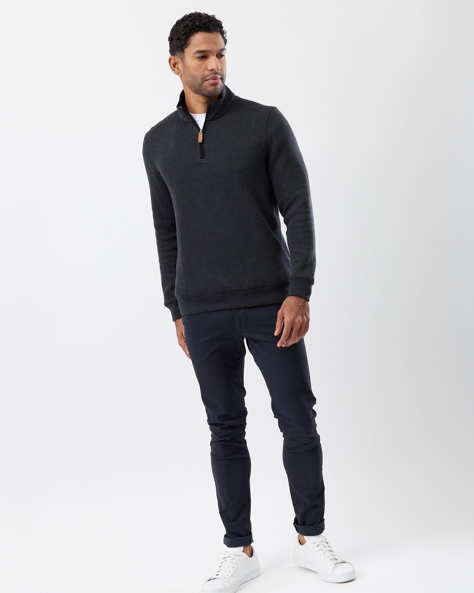 French rib knit styled with navy chinos and white sneakers for casual look, full body view

