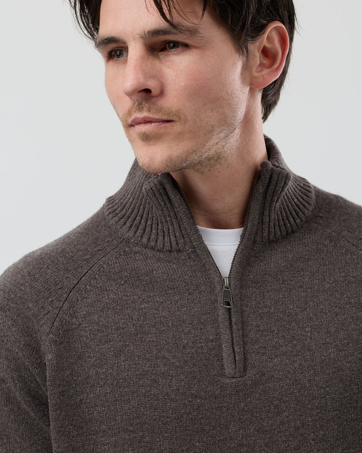 Close-up front view of the Wayver brown marl wool blend half zip knit showing the YKK metal zip, stand collar and premium marl knit texture.