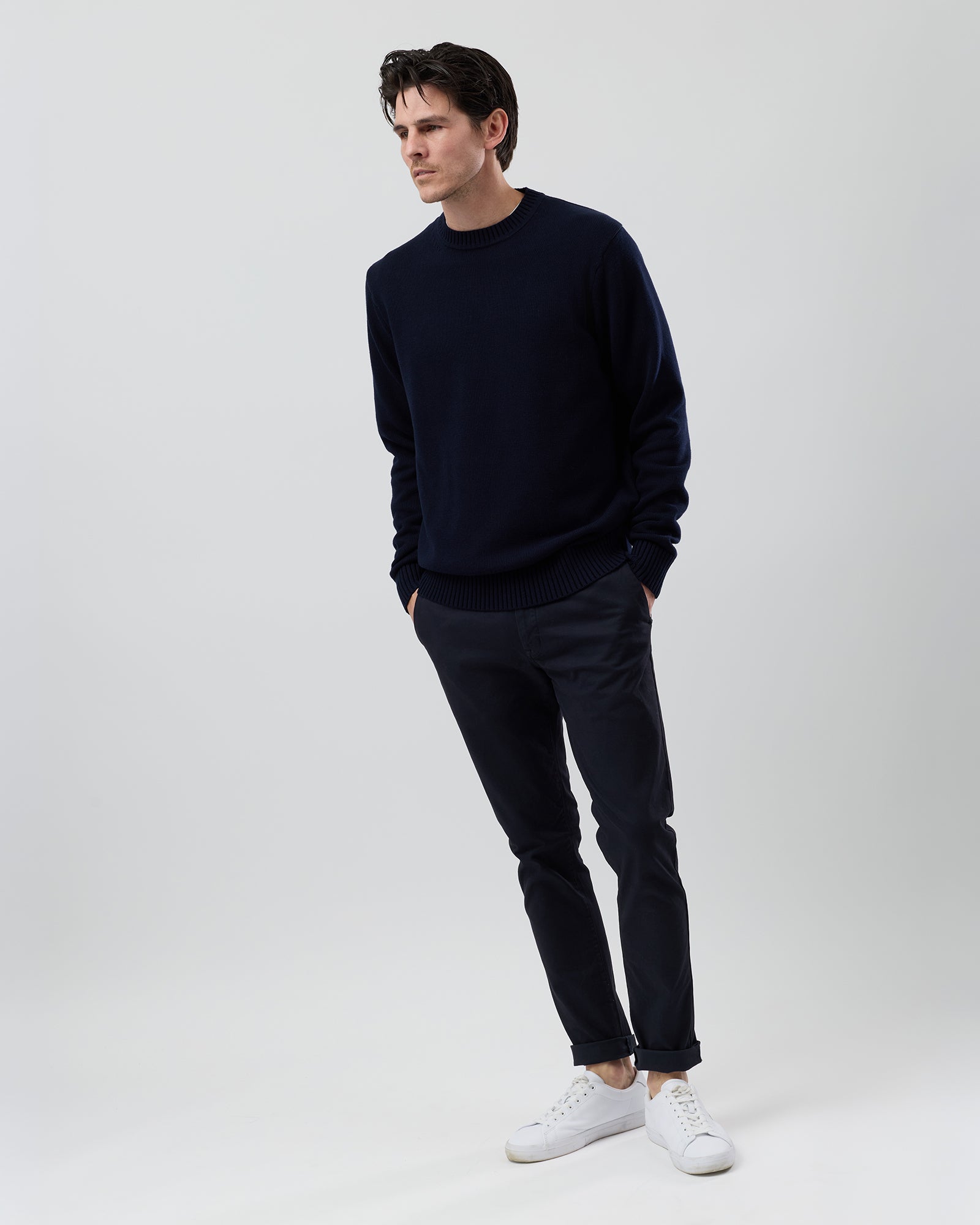 Rear view of the Wayver navy cotton crew neck jumper showing the clean back profile, ribbed hem and timeless knit design.
