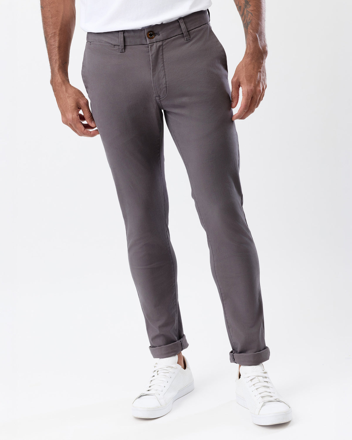 Front view of men's mid-grey slim stretch chinos highlighting the comfortable fit through the thighs and tapered legs.