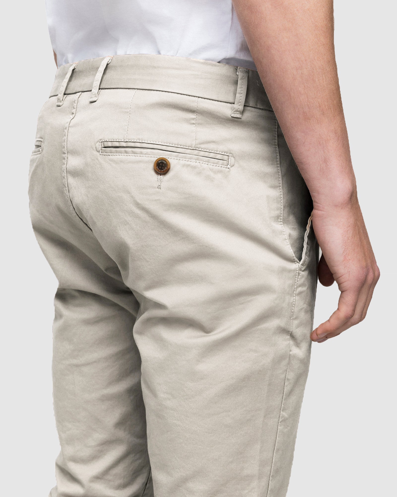 Side angle of pebble men’s stretch chino pants, slim fit