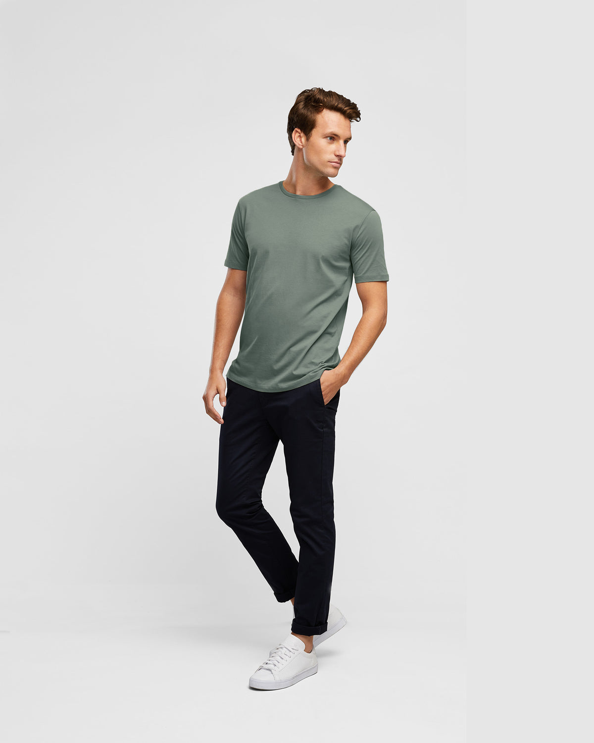 Premium Cotton Slim Fit Men's Tee in Sage Green, full body image on model